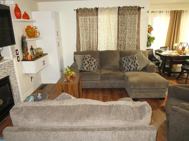 a living room with furniture and a table