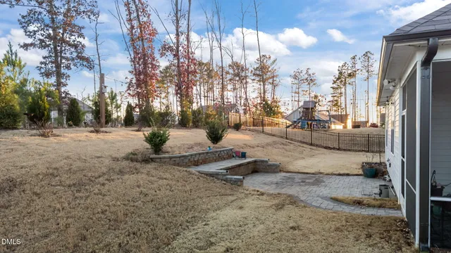 a view of a house with a snow in the yard