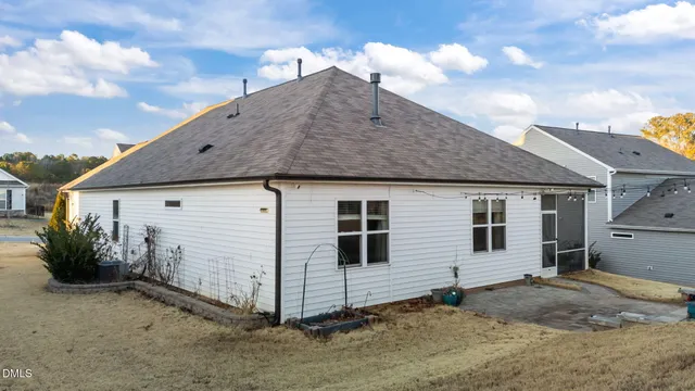 a room with furniture and wooden floor