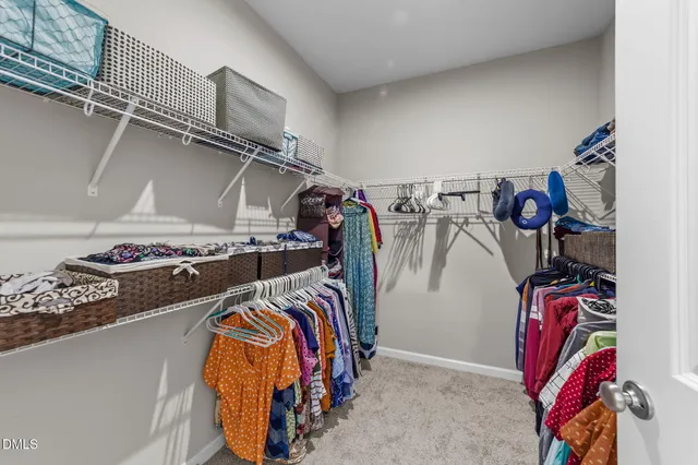 a view of a livingroom with furniture and window