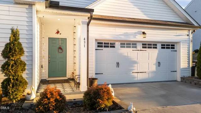 a view of a house with a garage
