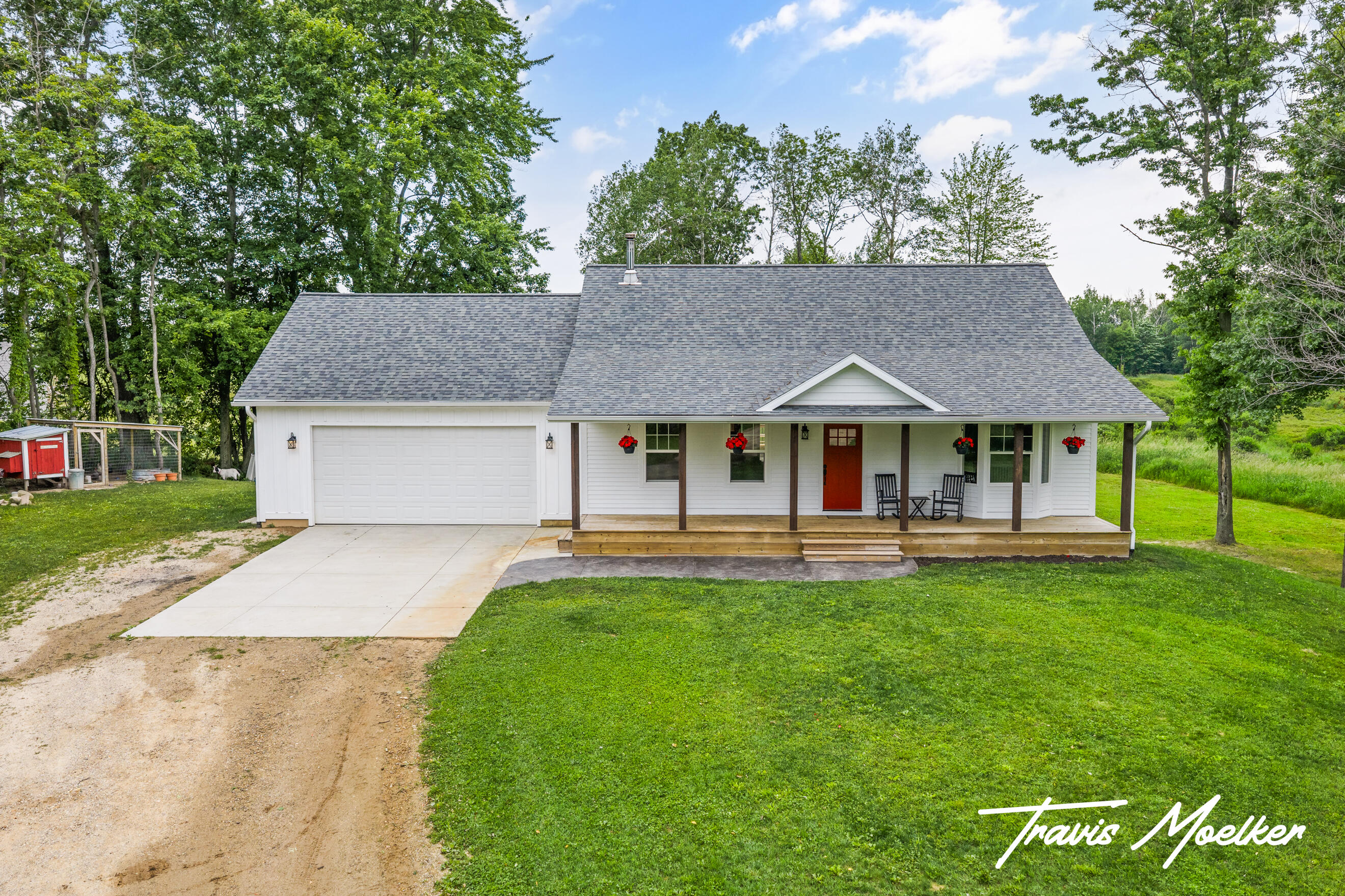 23438 Kimball Road Sand Lake, MI 49343 - Photo 1 of 43 DJI_20260617122529_0027_D