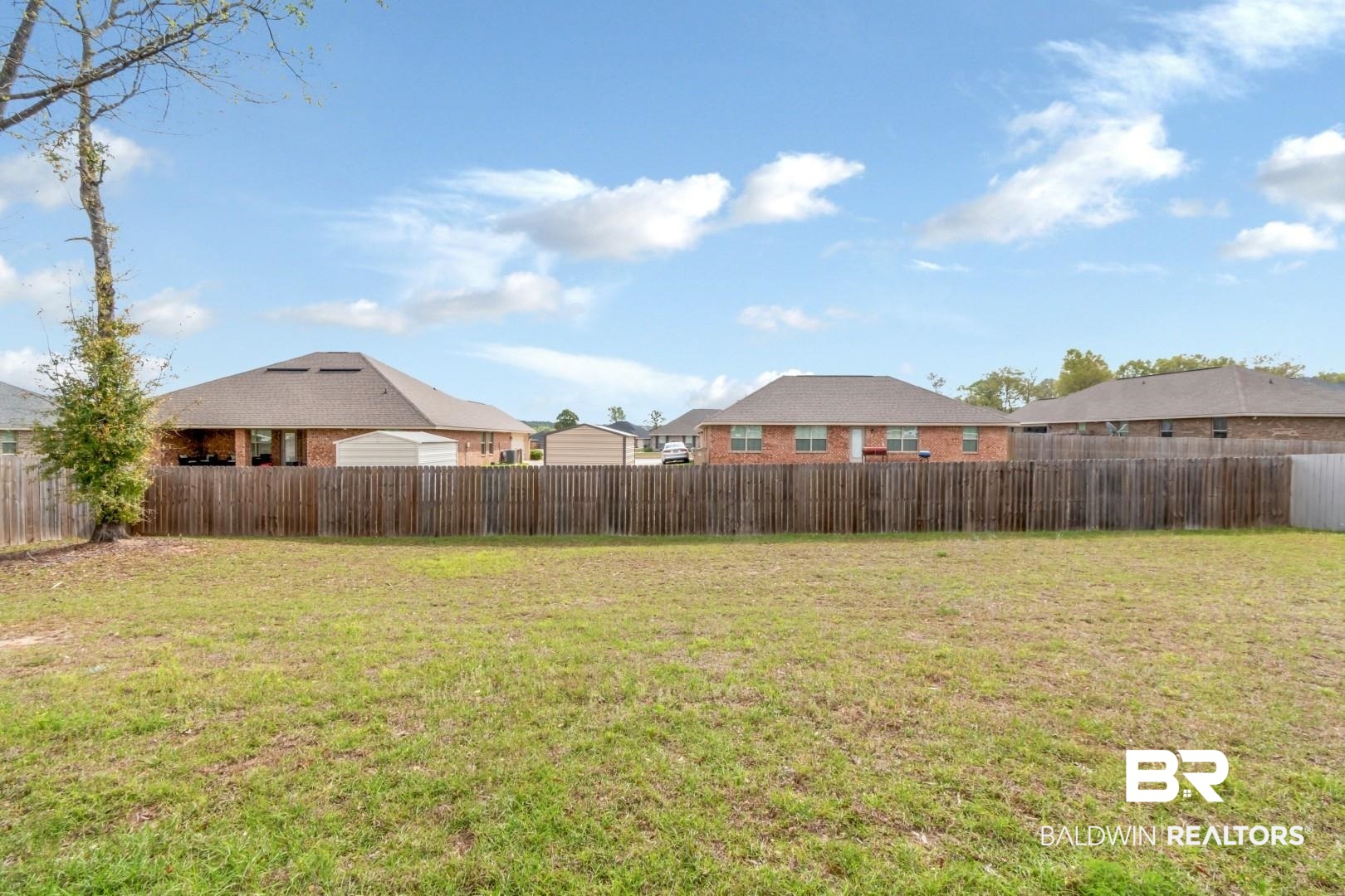6632 Monarch Circle Mobile, AL 36618 - Photo 30 of 32 Fenced backyard with a residential view