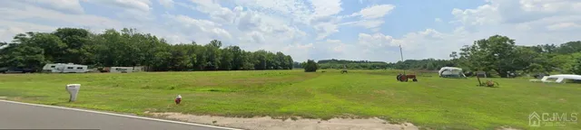a view of a golf course with a lake