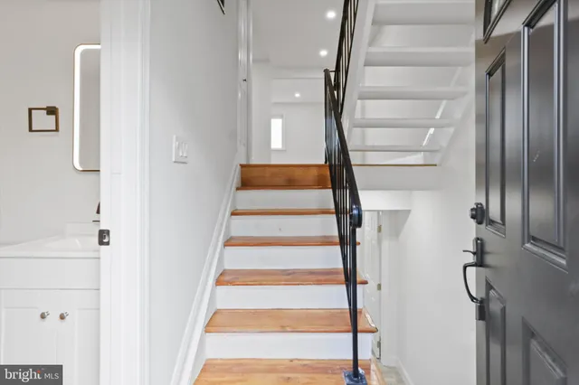 a view of entryway with wooden floor