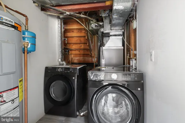 a utility room with dryer and washer