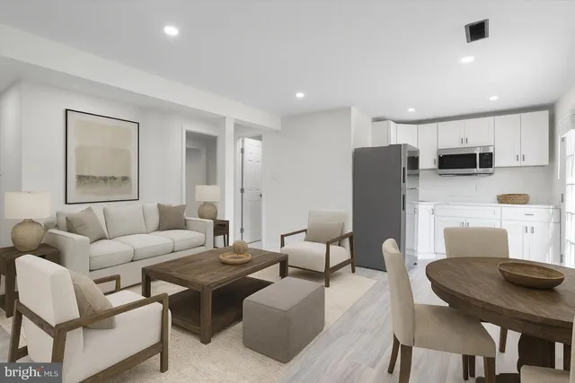 a living room with furniture and a table