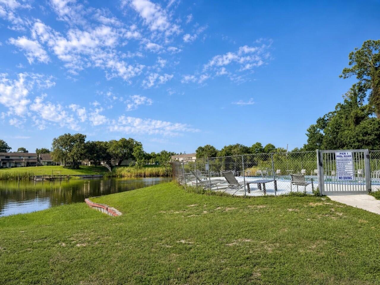 210 Pelham Road, Unit 8B Fort Walton Beach, FL 32547 - Photo 16 of 17 15-exterior_backyard_5