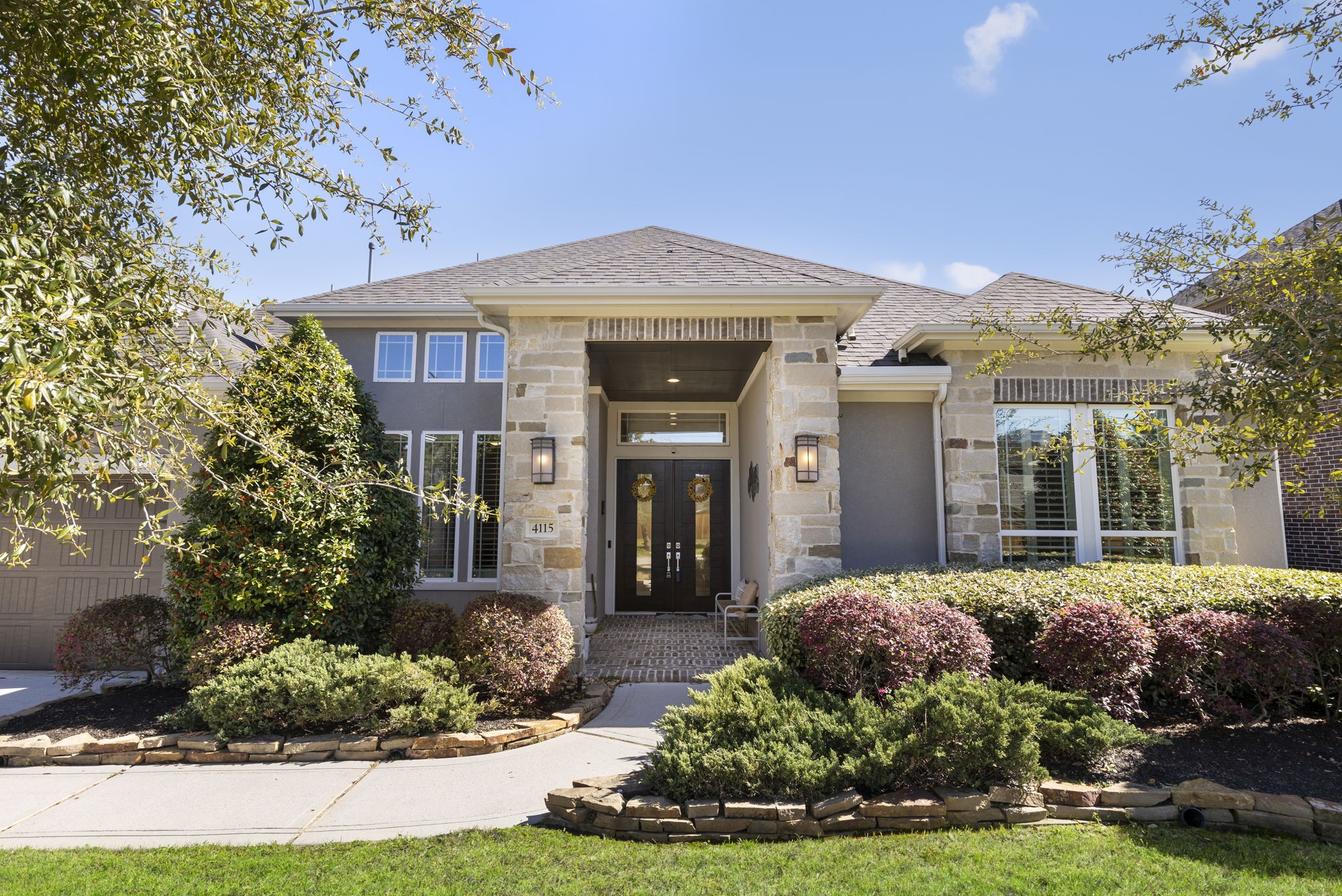 This exceptional one-story home is designed for both family living and entertaining, offering a harmonious blend of comfort and functionality. The thoughtfully crafted layout ensures privacy, with bedrooms strategically positioned in separate wings, making it ideal for families or hosting guests.