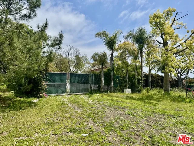 a wooden sign on the side of a building