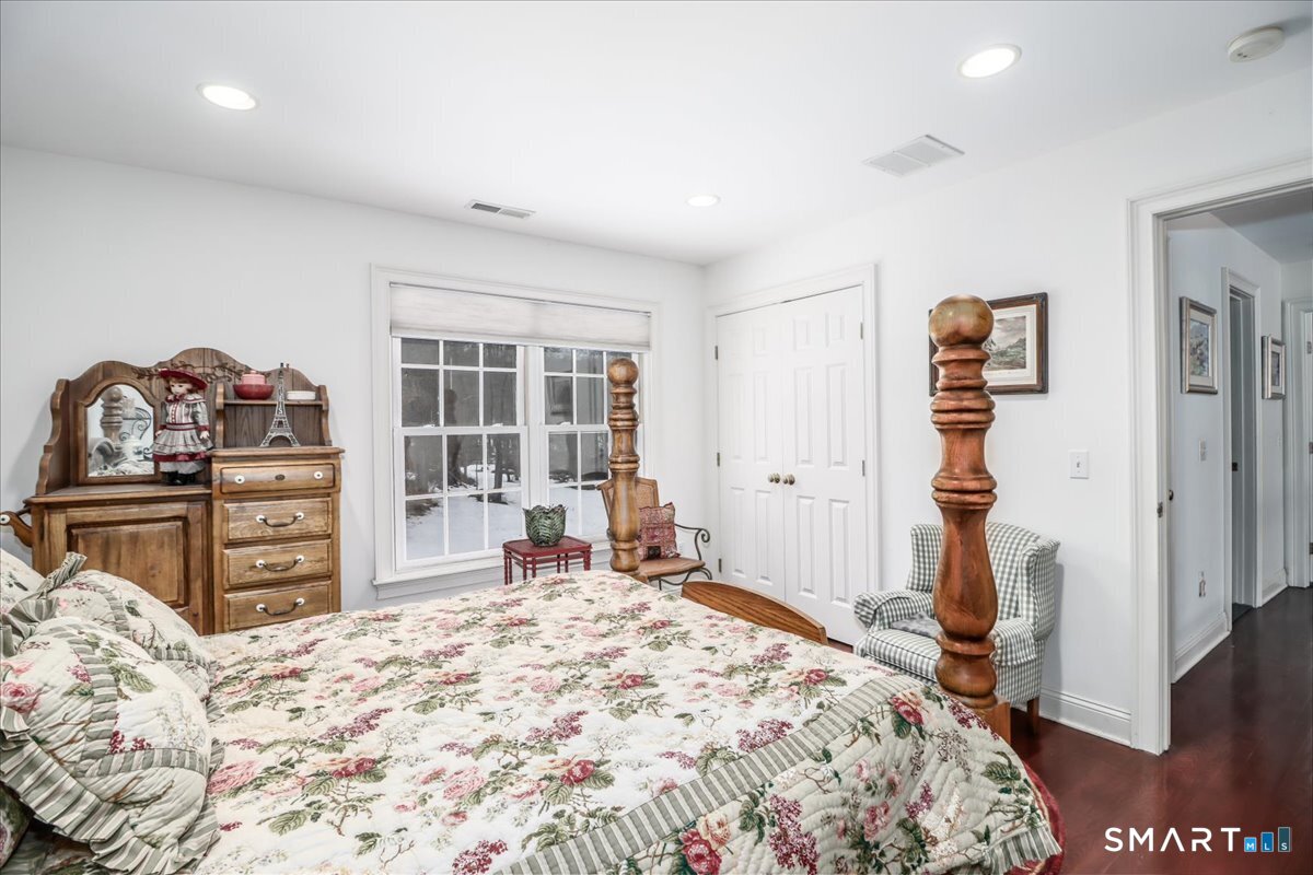 80 Maple Road Easton, CT 06612 - Photo 28 of 37 a bedroom with a bed and a television