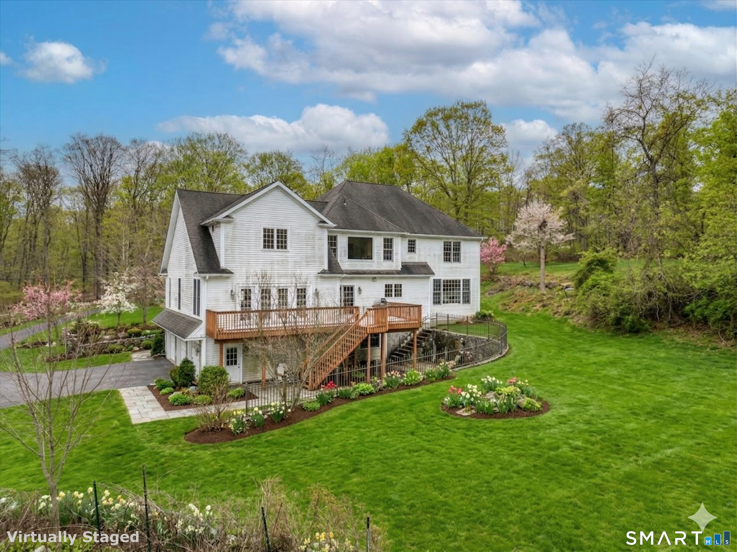 80 Maple Road Easton, CT 06612 - Photo 3 of 37 a view of a house with a big yard and potted plants
