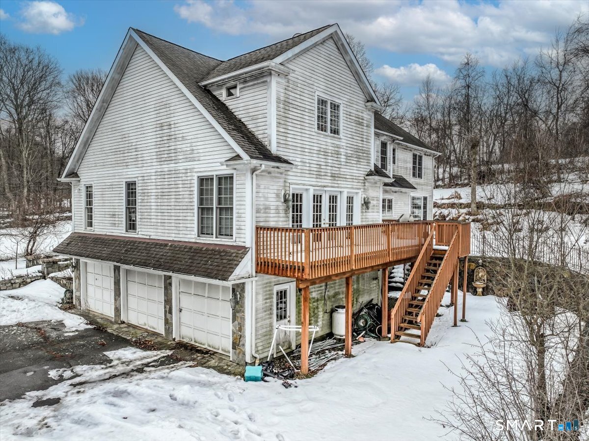 80 Maple Road Easton, CT 06612 - Photo 37 of 37 a view of a house with a patio and sitting area