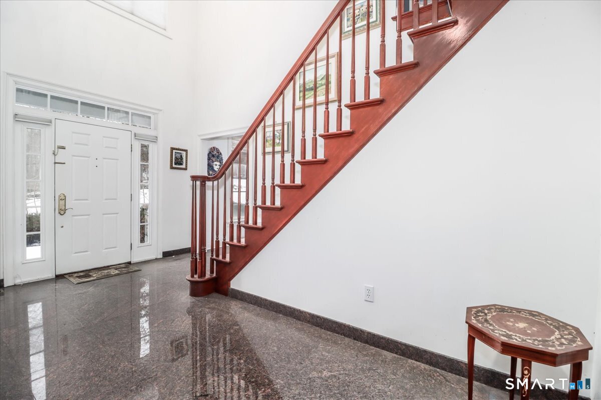 80 Maple Road Easton, CT 06612 - Photo 8 of 37 a view of a hallway with staircase