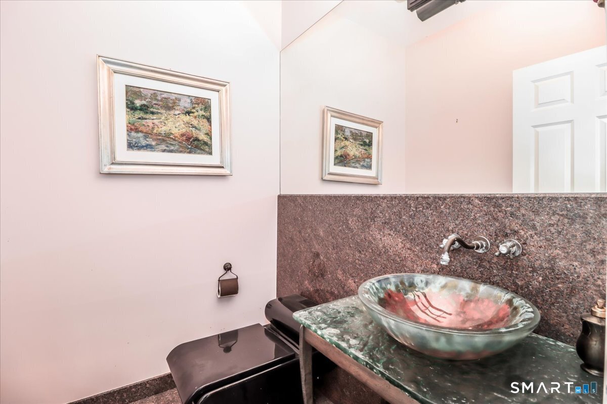 80 Maple Road Easton, CT 06612 - Photo 9 of 37 a bathroom with a granite countertop sink and a mirror
