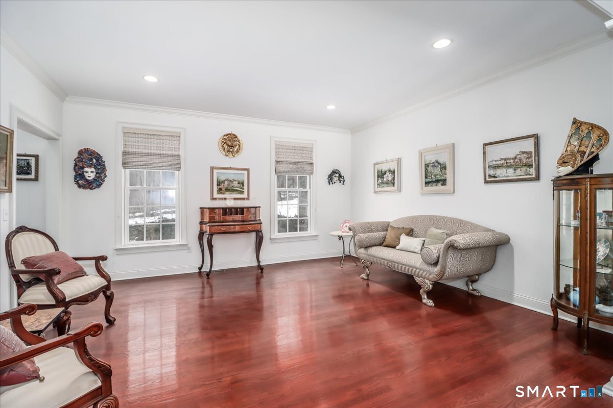 80 Maple Road Easton, CT 06612 - Photo 10 of 37 a living room with furniture and a window