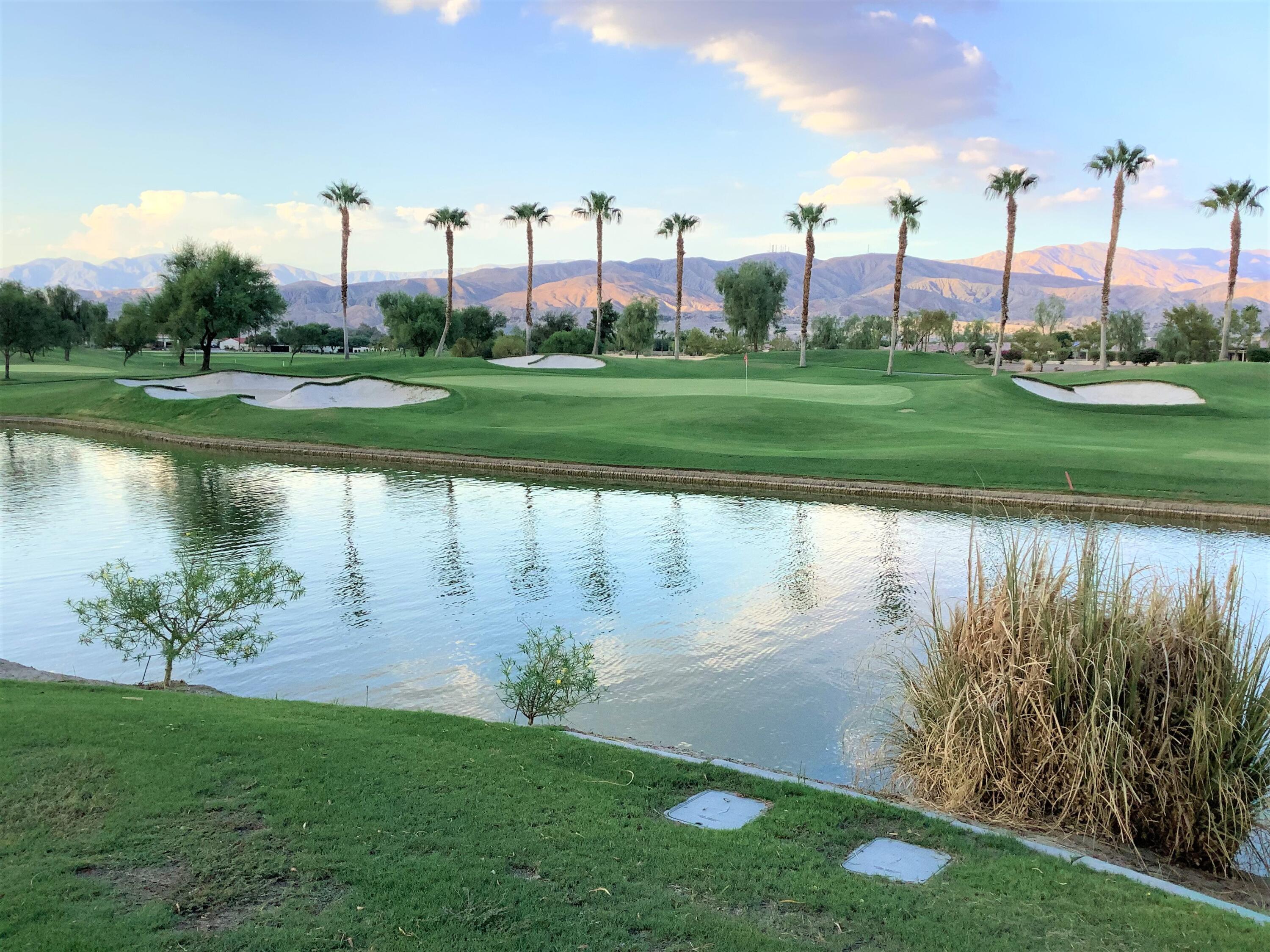 39929 Corte De Moda Indio, CA 92203 - Photo 28 of 46 a view of a lake with a big yard