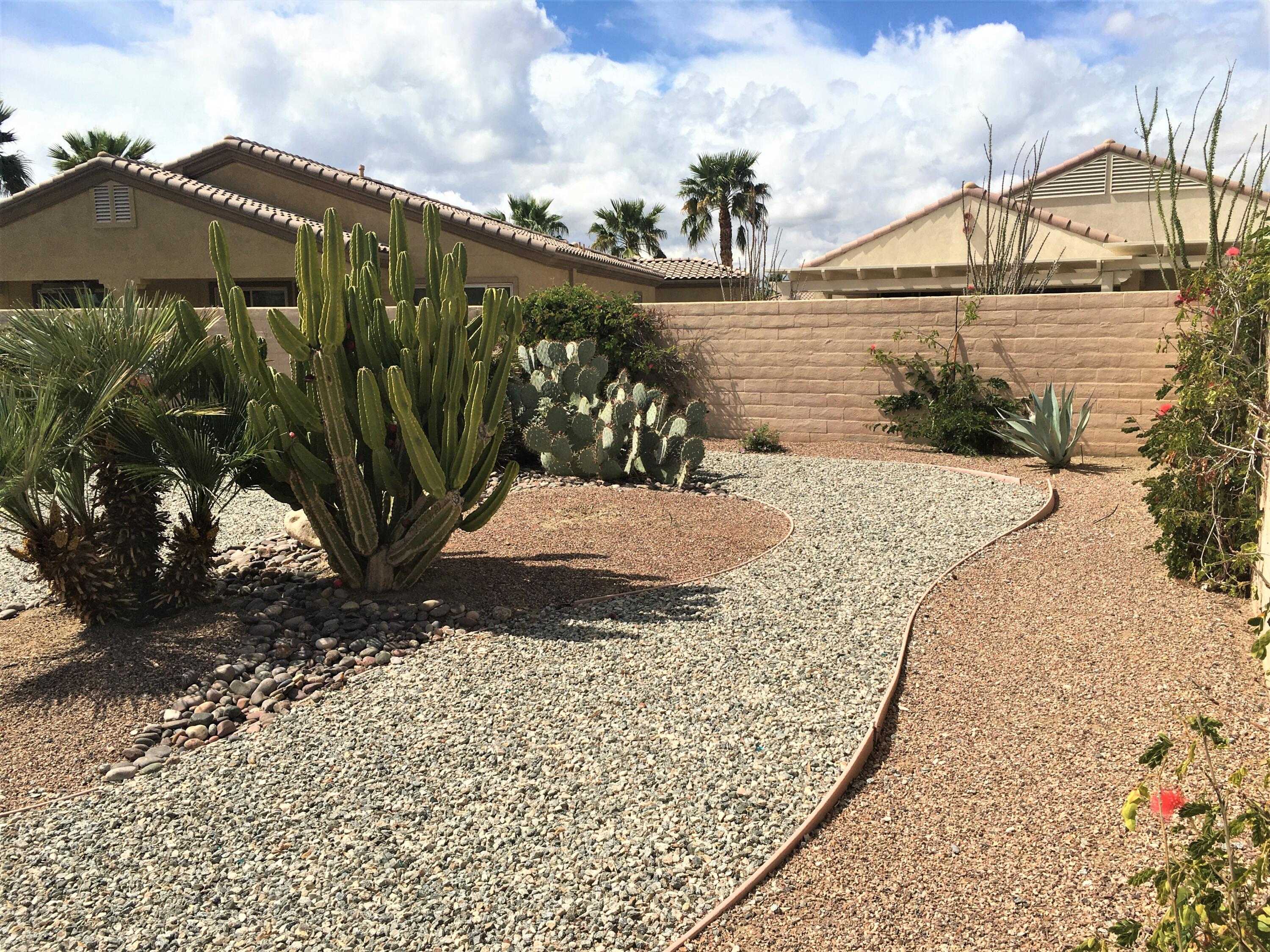 39929 Corte De Moda Indio, CA 92203 - Photo 5 of 46 a view of a house with a yard