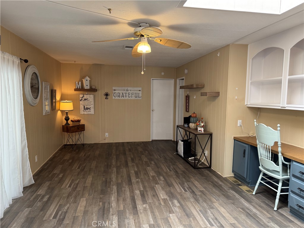 35218 Fir Avenue, Unit 183 Yucaipa, CA 92399 - Photo 17 of 35 a view of a workspace with furniture and wooden floor