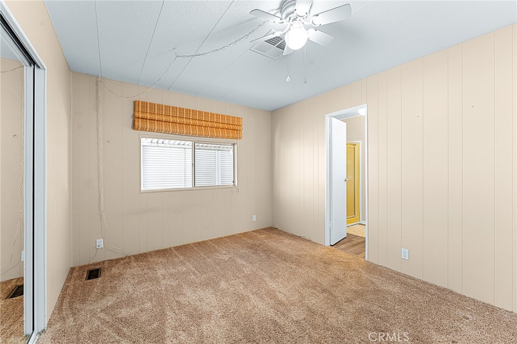 35218 Fir Avenue, Unit 183 Yucaipa, CA 92399 - Photo 22 of 35 a view of an empty room with a window