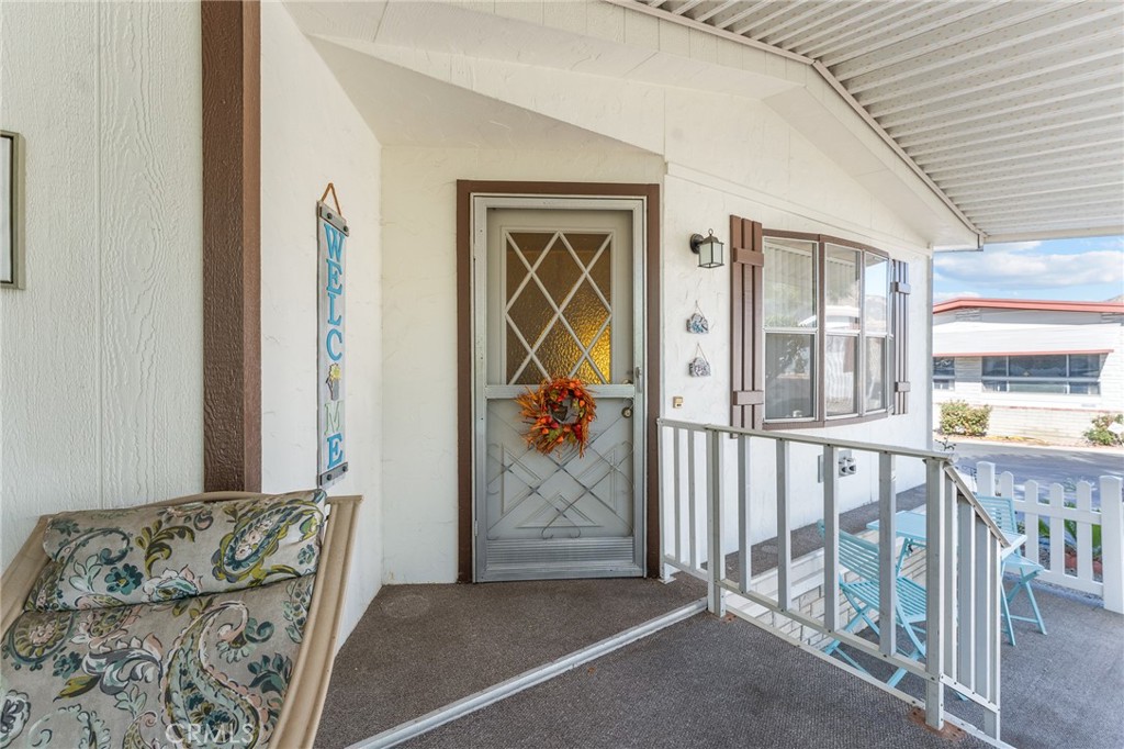 35218 Fir Avenue, Unit 183 Yucaipa, CA 92399 - Photo 4 of 35 a view of a livingroom with furniture and front door