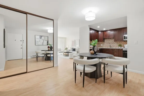 a view of a dining room with furniture