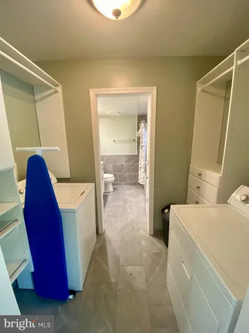 a view of living room washer and dryer