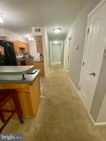 a bathroom with a sink a mirror and shower