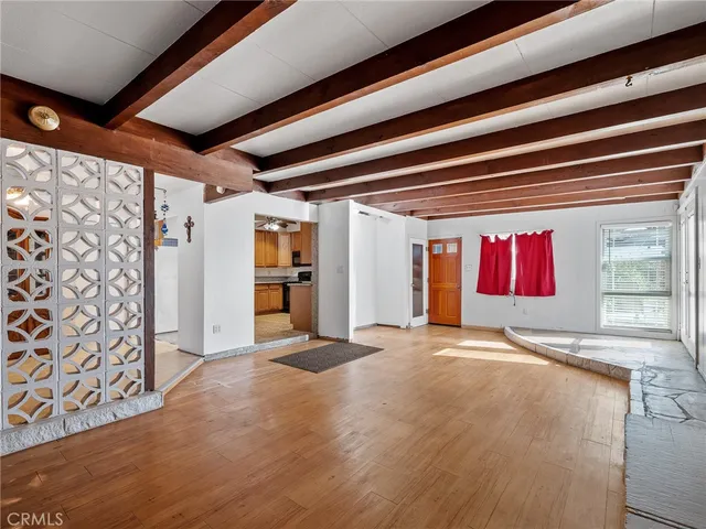 a bathroom with a sink a toilet and shower curtain