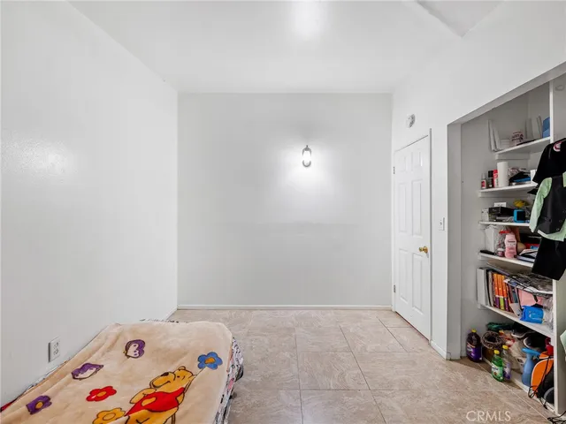 a view of a house with a yard and a garden