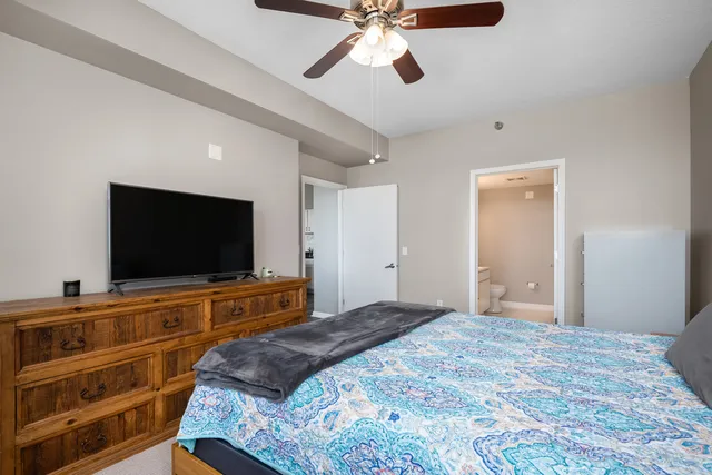 a bathroom with a double vanity sink mirror and toilet