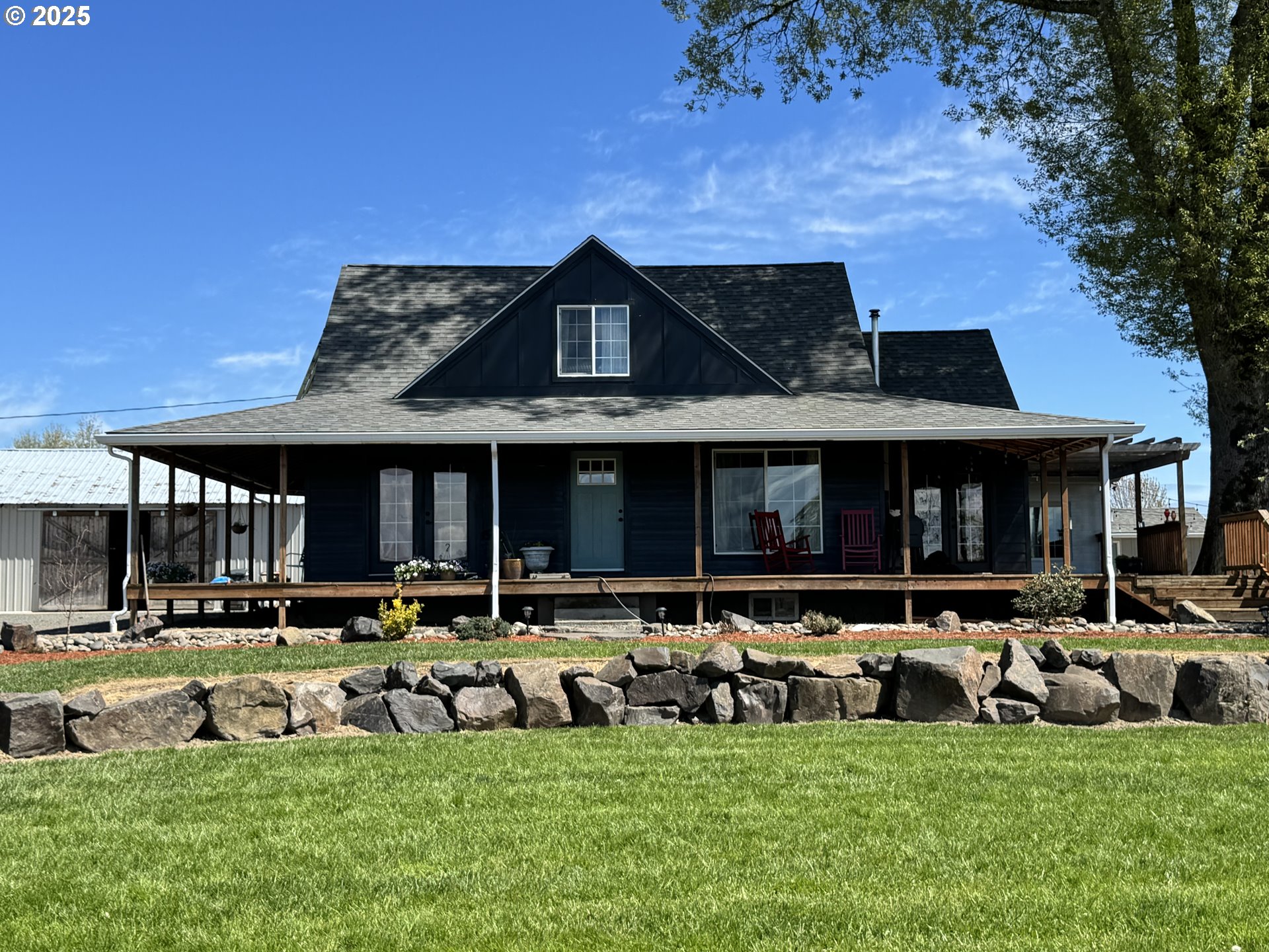 a group of chairs and tables in front of building