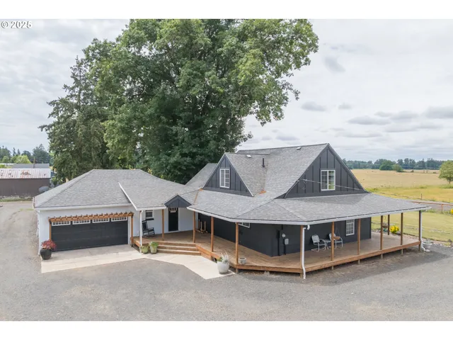 a view of a house with roof deck front of house