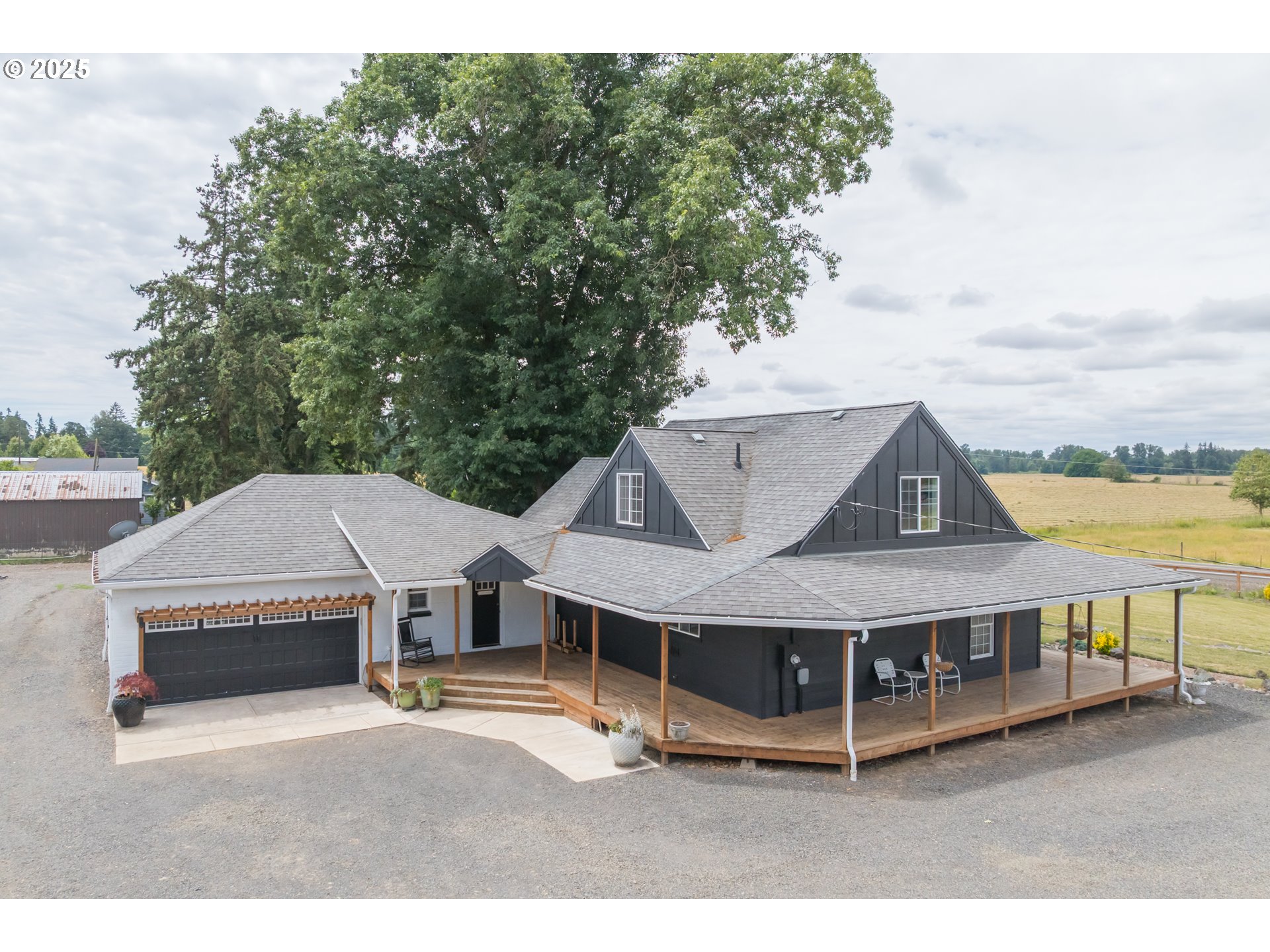37929 Kelly Road Scio, OR 97374 - Photo 17 of 48 a view of a house with roof deck front of house