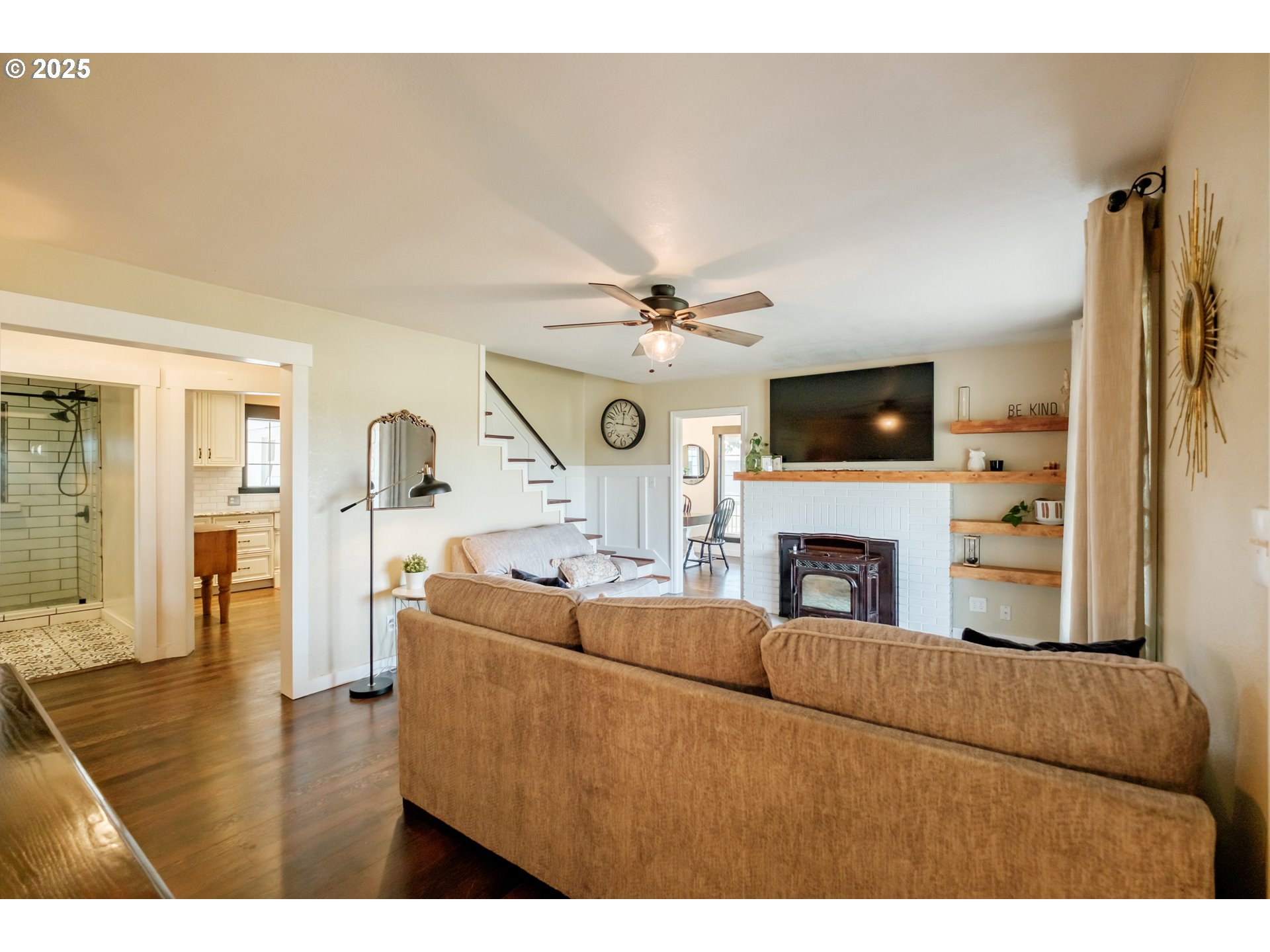 37929 Kelly Road Scio, OR 97374 - Photo 3 of 48 a living room with furniture a fireplace and a flat screen tv