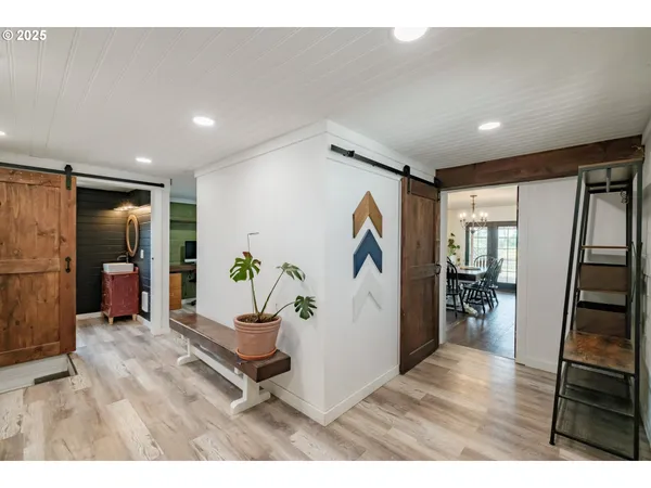 a view of a kitchen with washer and dryer