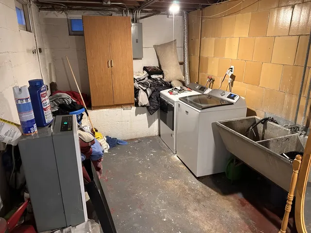 a storage room with washer and dryer