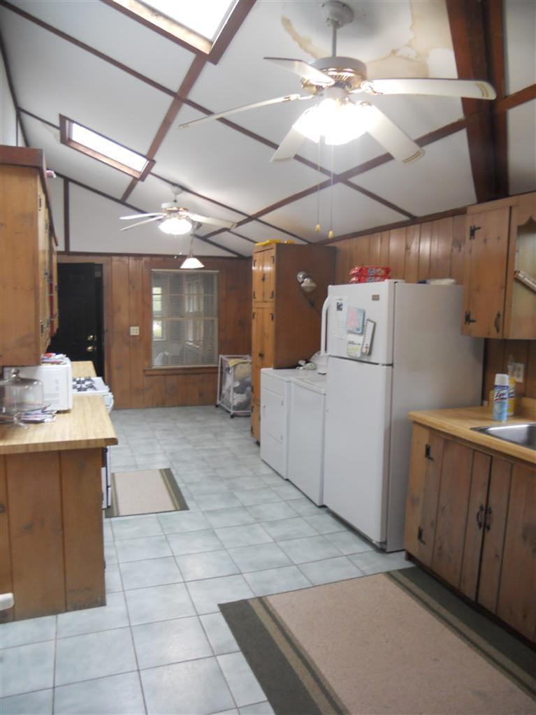 40 Bayview Road Mashpee, MA 02649 - Photo 19 of 23 a utility room with cabinets and washer dryer