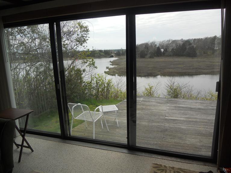 40 Bayview Road Mashpee, MA 02649 - Photo 23 of 23 a view of a glass door and chair