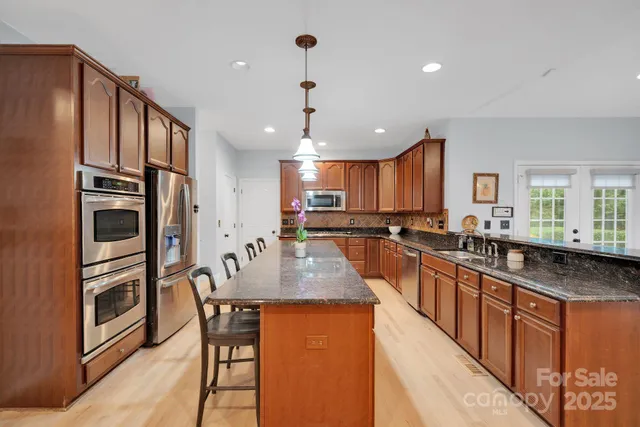 $900,000 | 6809 Old Persimmon Drive, Mint Hill, NC 28227