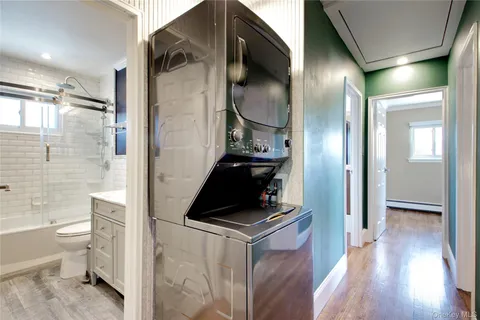 a kitchen with a refrigerator and a stove