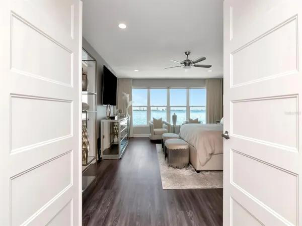 a spacious bathroom with a double vanity sink and a mirror