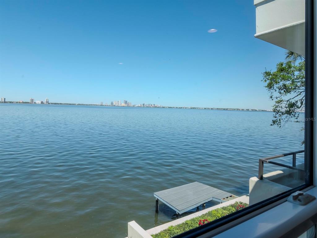 2807 West Hawthorne Road, Unit 11 Tampa, FL 33611 - Photo 41 of 76 a view of an ocean from a balcony