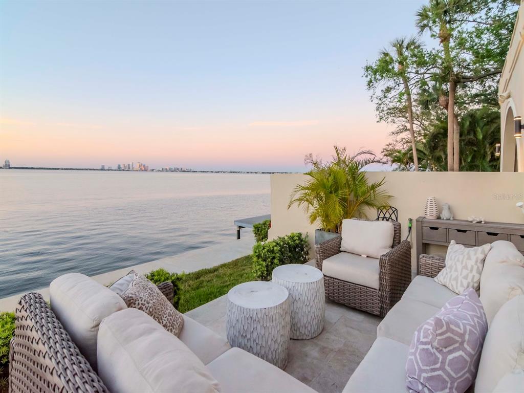 2807 West Hawthorne Road, Unit 11 Tampa, FL 33611 - Photo 59 of 76 a view of a patio with couches and potted plants