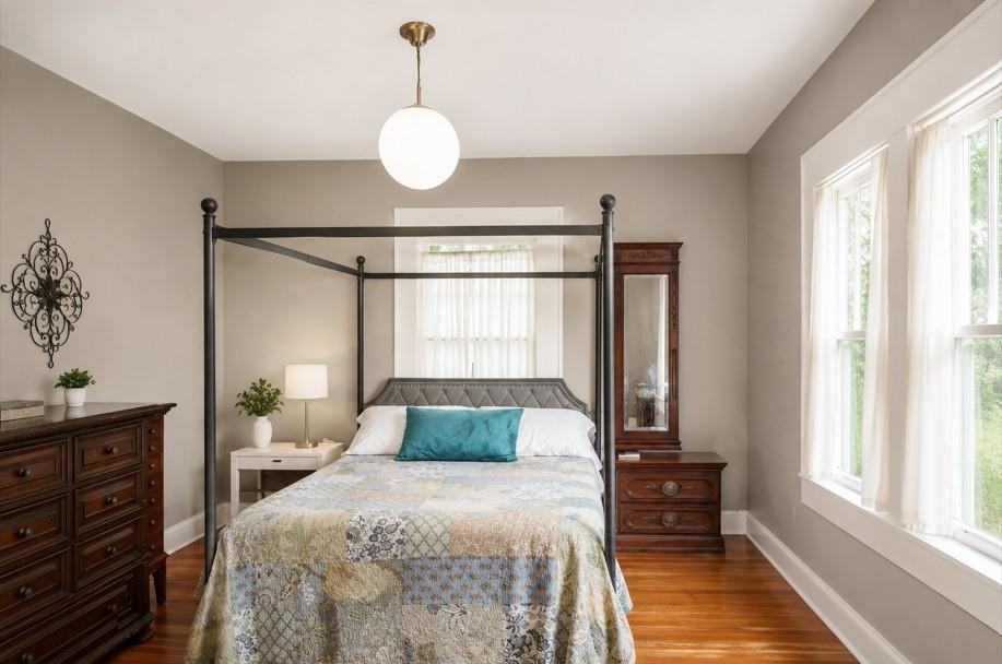 1500 Bonham Street Commerce, TX 75428 - Photo 7 of 29 a bedroom with a large bed and a window