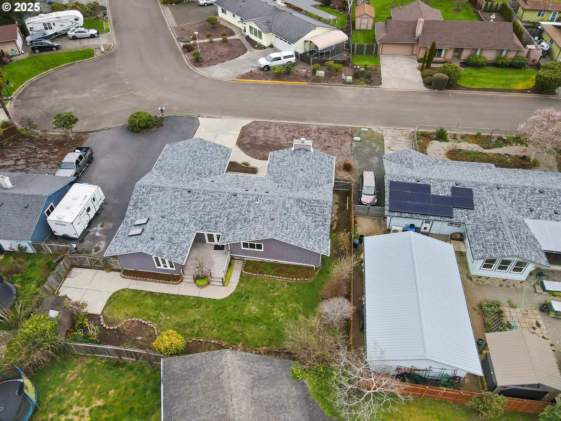 550 Evergreen Loop Reedsport, OR 97467 - Photo 34 of 35 an aerial view of a house with a swimming pool