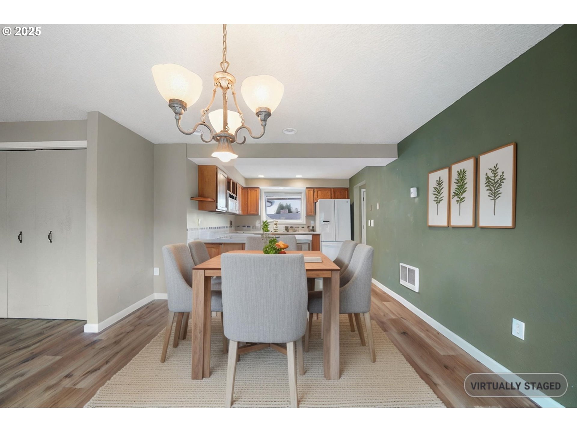 550 Evergreen Loop Reedsport, OR 97467 - Photo 7 of 35 a view of a dining room with furniture and wooden floor