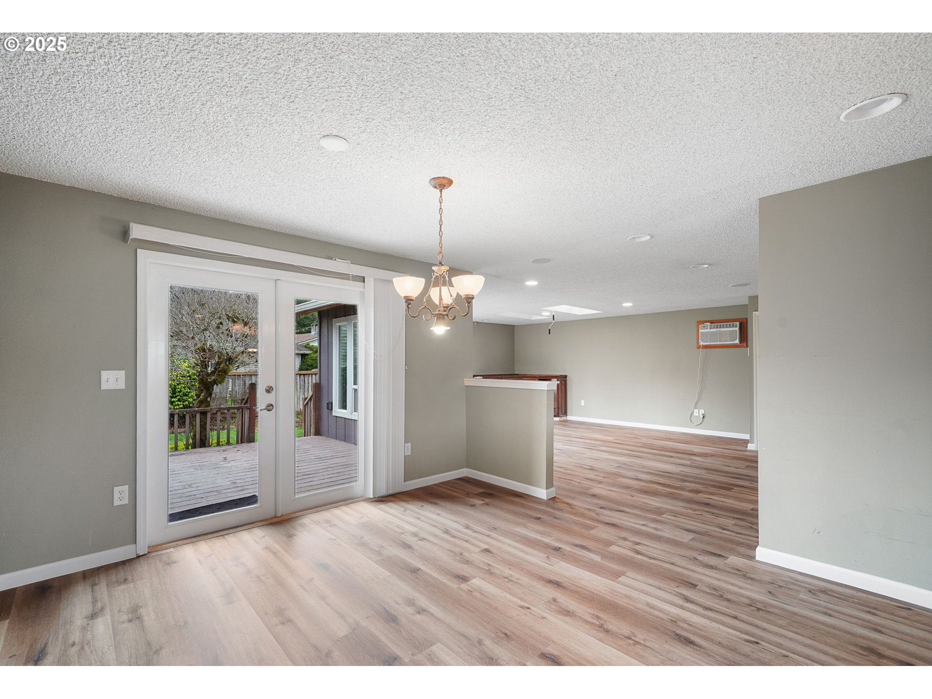 550 Evergreen Loop Reedsport, OR 97467 - Photo 9 of 35 a view interior of a house wooden floor and windows