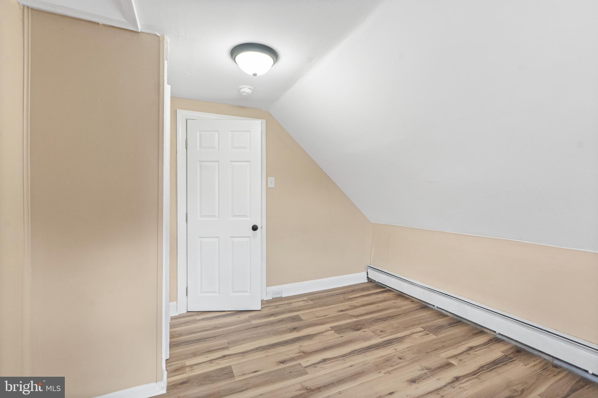 50 Pine Street Beverly, NJ 08010 - Photo 13 of 18 a view of an empty room with wooden floor