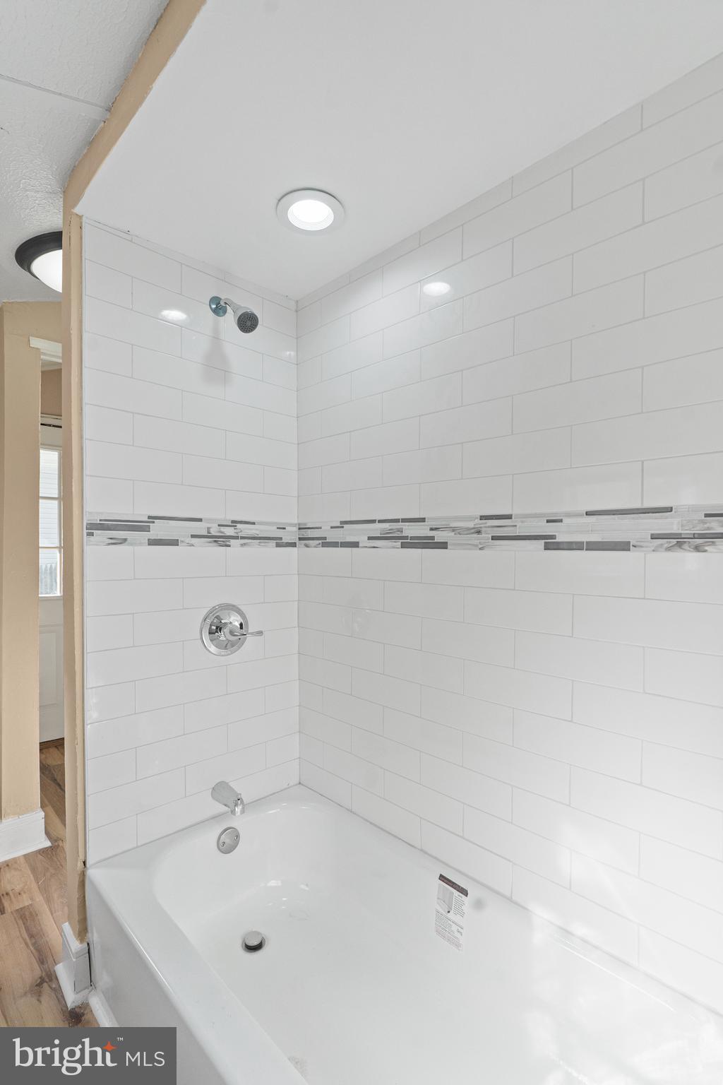 50 Pine Street Beverly, NJ 08010 - Photo 8 of 18 a bathroom with a shower and a sink
